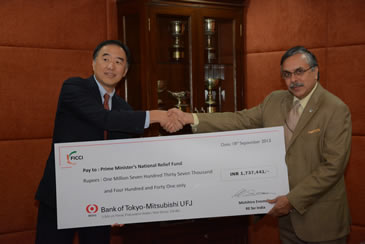 FICCI Events: FICCI member Bank of Tokyo contributes to Prime Minister's Relief Fund for Uttarakhand Rehabilitation by handing over the cheque to SG FICCI