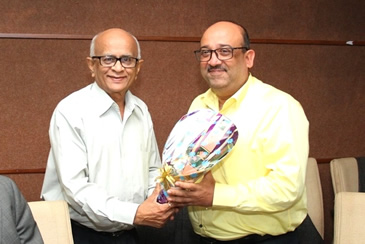 FICCI Events: (Left to Right) Felicitation by Mr. Chandrakant Jariwala, President, SGCCI to Shri Girish Luthra, Luthra Group of Industries & Executive Committee Member, FICCI CMSME