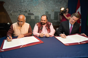 FICCI Events: MoU signing between FICCI and City of Toronto; 9th September 2015 in Toronto by Mr. John Tory, Mayor of Toronto, Mr. Akhilesh Mishra, Counsul General, Indian Consulate in Toronto, and Dr. Ashish Kulkarni, Chairman, FICCI-Animation, Viaual Effects, Gaming and Comics Forum for mutual co operation in the field of Media & Entertainment