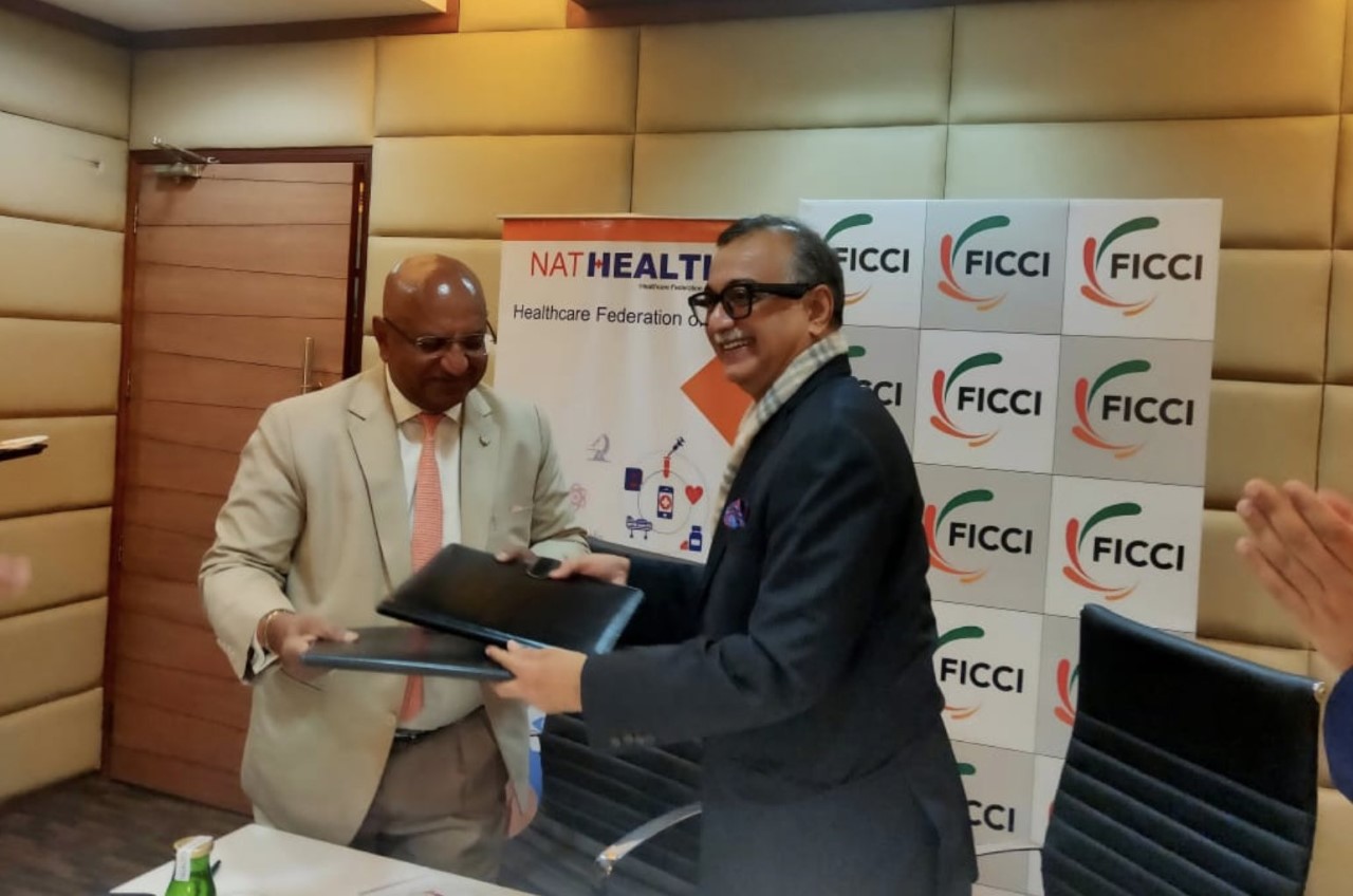 FICCI Events: L-R (Hony.) Brig Dr Arvind Lal, Chair, FICCI Health Services with Dr H Sudarshan Ballal, President, NATHEALTH during the MoU signing